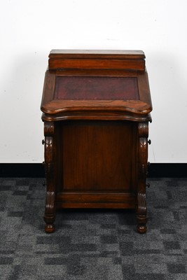 Lot 123 - A late 19th century and later oak Davenport writing desk