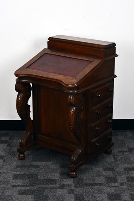 Lot 123 - A late 19th century and later oak Davenport writing desk