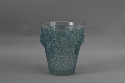 Lot 124 - A Lalique stained blue glass Silenes vase