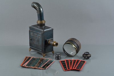 Lot 392 - A Tin Plate toy Magic Lantern