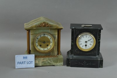 Lot 154 - A clock garniture