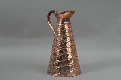 Lot 163 - A copper jug