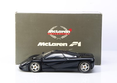 Lot 423 - Paul's Model Art (Minichamps) McLaren Collection 1:12 McLaren F1 Roadcar (Dark Blue Metallic)