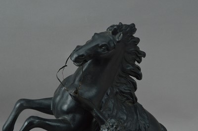 Lot 182 - A modern metal sculpture of a stallion and man