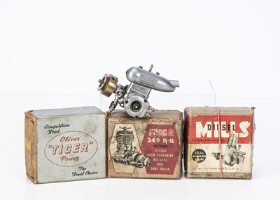 Lot 694 - Three small Model Aircraft Aero Engines and one small Marine Engine (4)