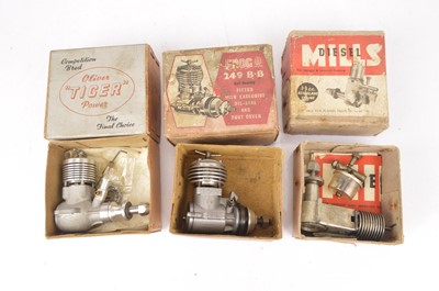 Lot 694 - Three small Model Aircraft Aero Engines and one small Marine Engine (4)