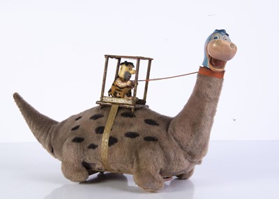 Lot 704 - A Marx Toys (Japan) Battery-Operated Fred Flintstone On Dino