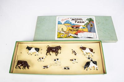 Lot 756 - Britains boxed farm set 122F with most pieces still strung into box comprising cows (4)