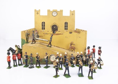 Lot 761 - A lot of solid and hollow cast lead figures including examples by Britains comprising marching British Marines Bandsmen (12)