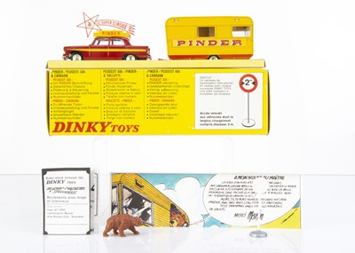 Lot 162 - A French Dinky Toys 882 Pinder's Circus Peugeot 404 & Caravan