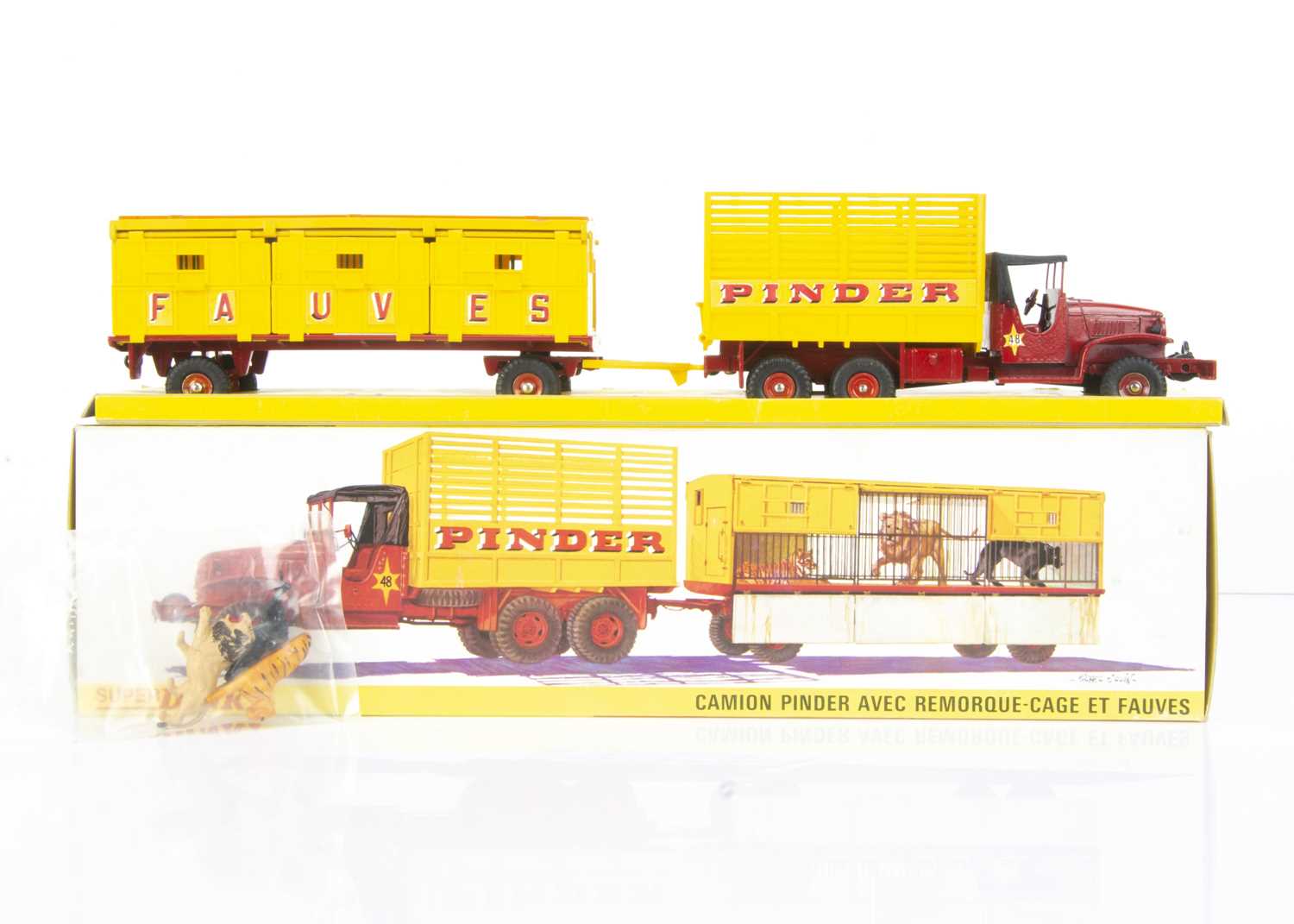Lot 163 - A French Super Dinky Toys 881 Pinder's Circus GMC Truck & Animal Trailer