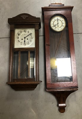 Lot 219 - Two 20th century wooden cased wall mounted clocks