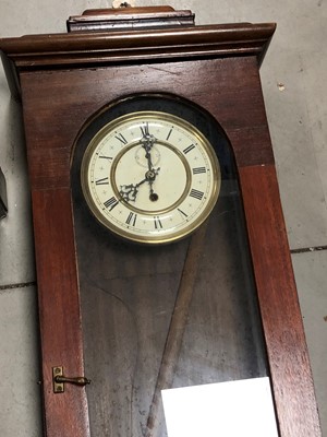 Lot 219 - Two 20th century wooden cased wall mounted clocks