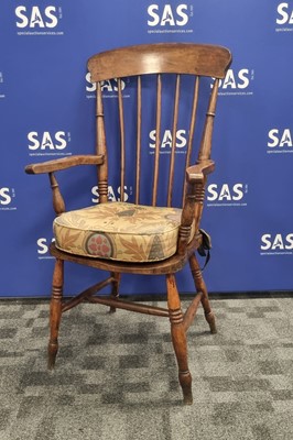 Lot 110 - A early 20th century oak and beech single armchair