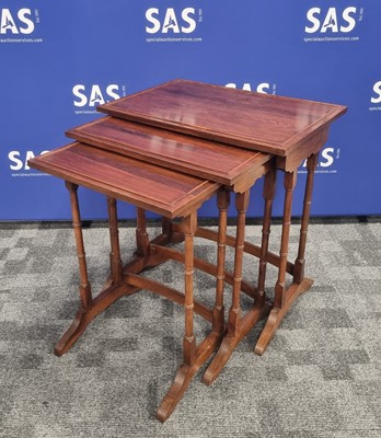 Lot 115 - A contemporary nest of three hardwood occasional tables