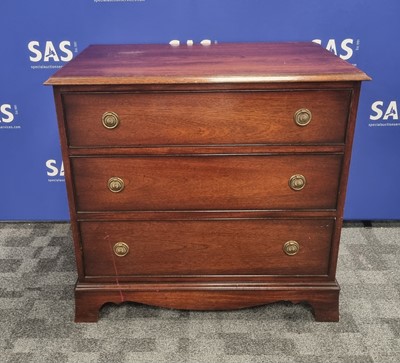 Lot 119 - A contemporary mahogany chest of three long drawers