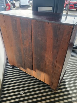 Lot 126 - A 19th century mahogany bow fronted chest of two short over three long drawers