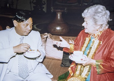 Lot 151 - A green and gilt metal buttoned day dress