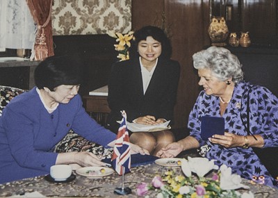 Lot 163 - A Patricia Warnes cotton purple dress with black zig zag decoration and another light green example