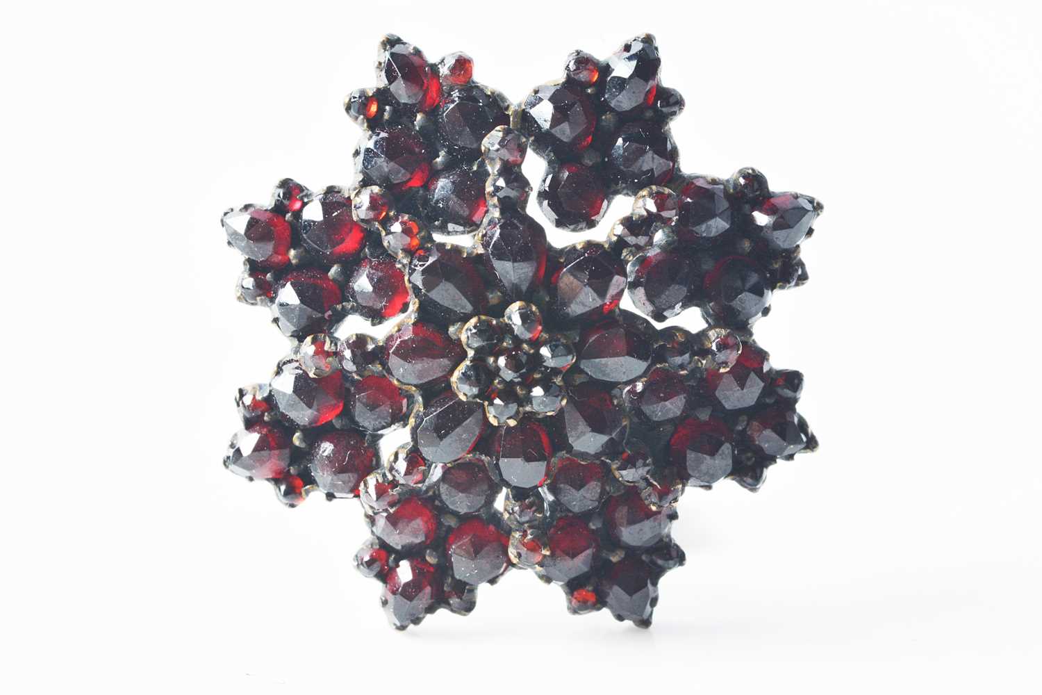Lot 178 - A 19th Century Bohemian garnet star brooch