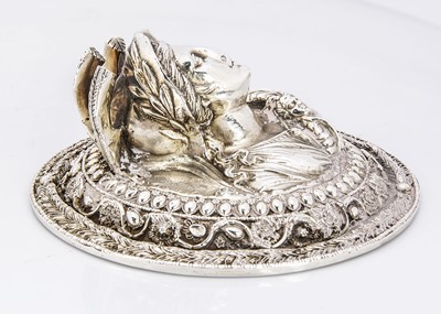 Lot 186 - A continental white metal paperweight