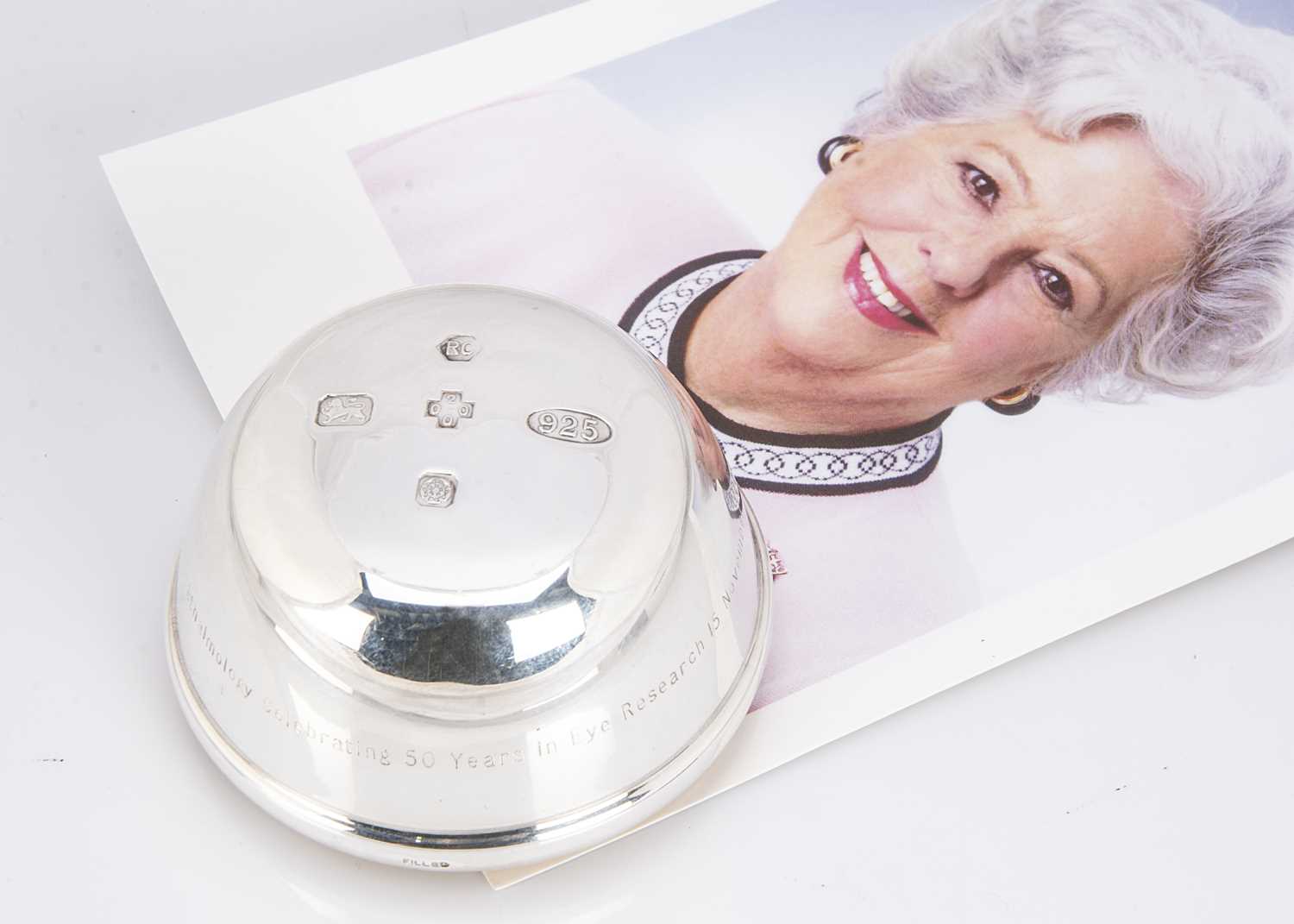 Lot 190 - A contemporary silver and light wood paper weight