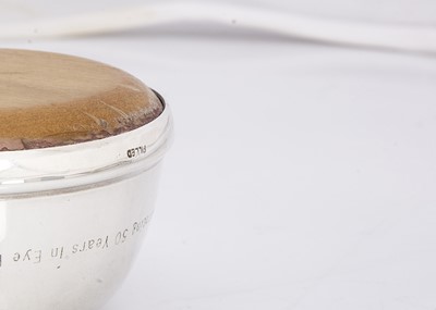 Lot 190 - A contemporary silver and light wood paper weight