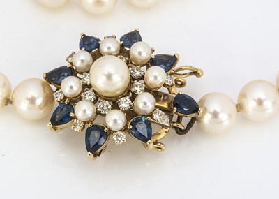 Lot 203 - An opera length uniform cultured knotted pearl necklace