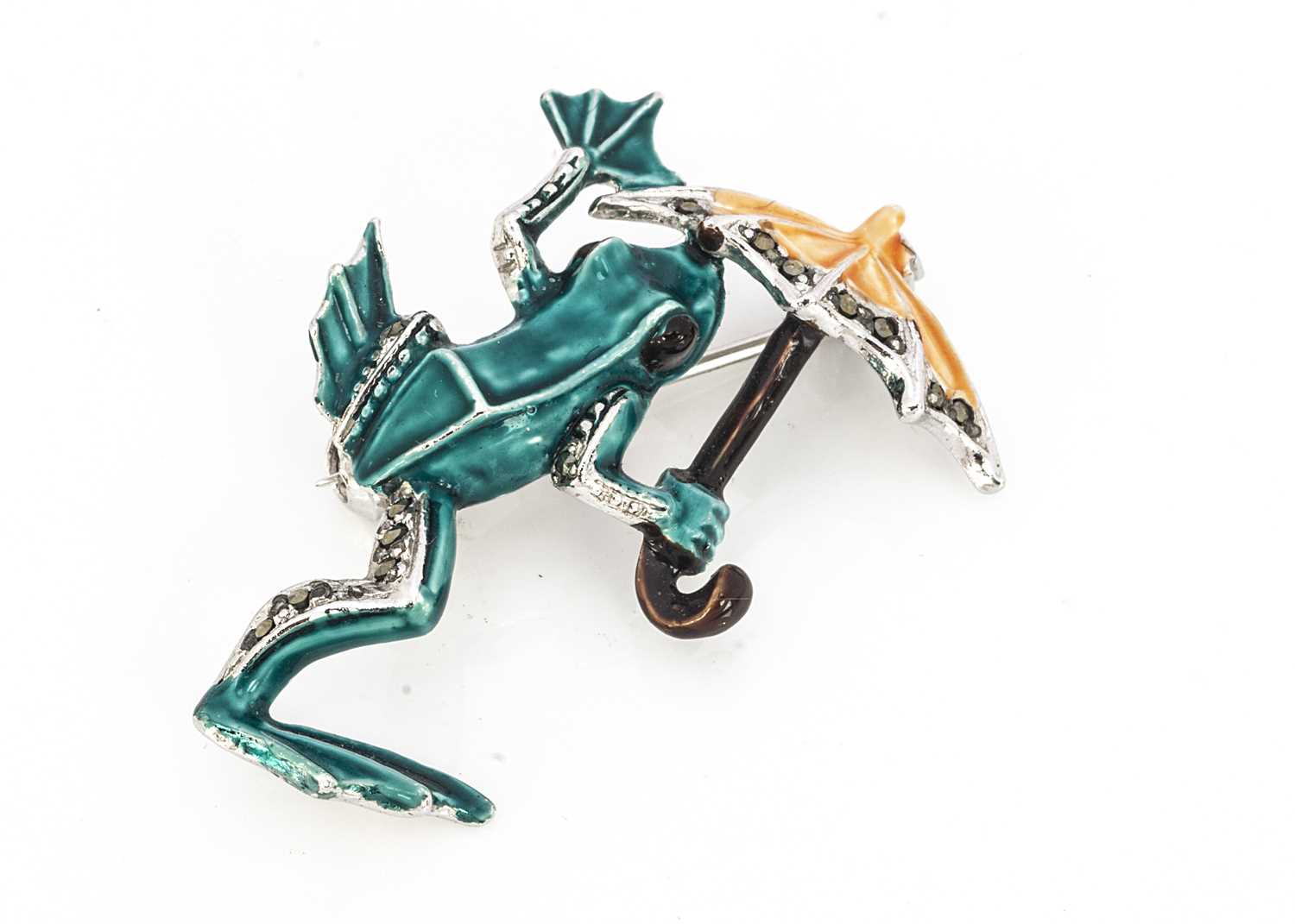 Lot 206 - A comical enamel chrome plated and marcasite frog brooch