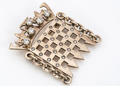 Lot 217 - A yellow metal diamond and cz set House of Commons speakers brooch