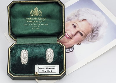 Lot 221 - A pair of Oscar Heyman of New York diamond encrusted cuff earrings