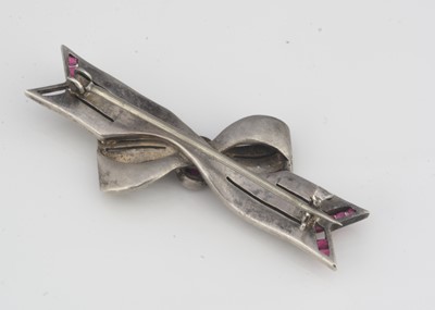 Lot 8 - A continental white metal and paste set bow brooch