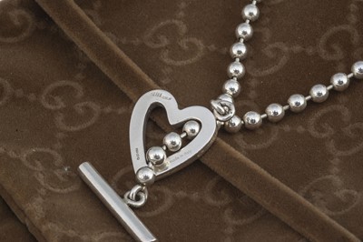Lot 24 - A Gucci silver heart necklace