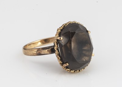 Lot 52 - A c1960s 18ct gold and smoky quartz cocktail dress ring