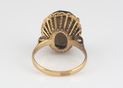 Lot 52 - A c1960s 18ct gold and smoky quartz cocktail dress ring