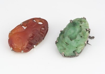 Lot 58 - A late 19th or early 20th Century carved Chinese jade silver mounted brooch