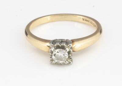 Lot 63 - An 18ct gold Columbia marked diamond solitaire