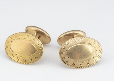 Lot 99 - A pair of 14ct gold fixed link oval cufflinks