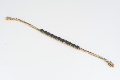 Lot 107 - An 18ct gold sapphire line bracelet