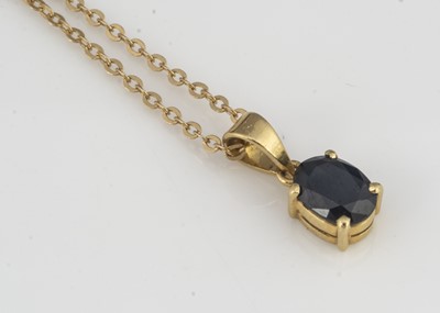 Lot 109 - An 18ct gold sapphire pendant