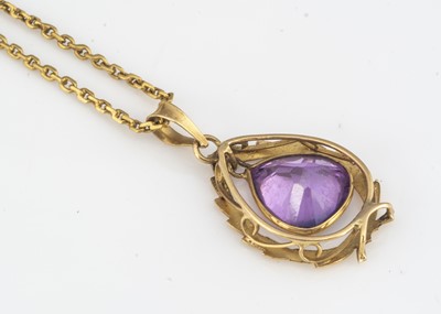 Lot 118 - A Middle Eastern synthetic pink sapphire and high carat gold pendant and chain