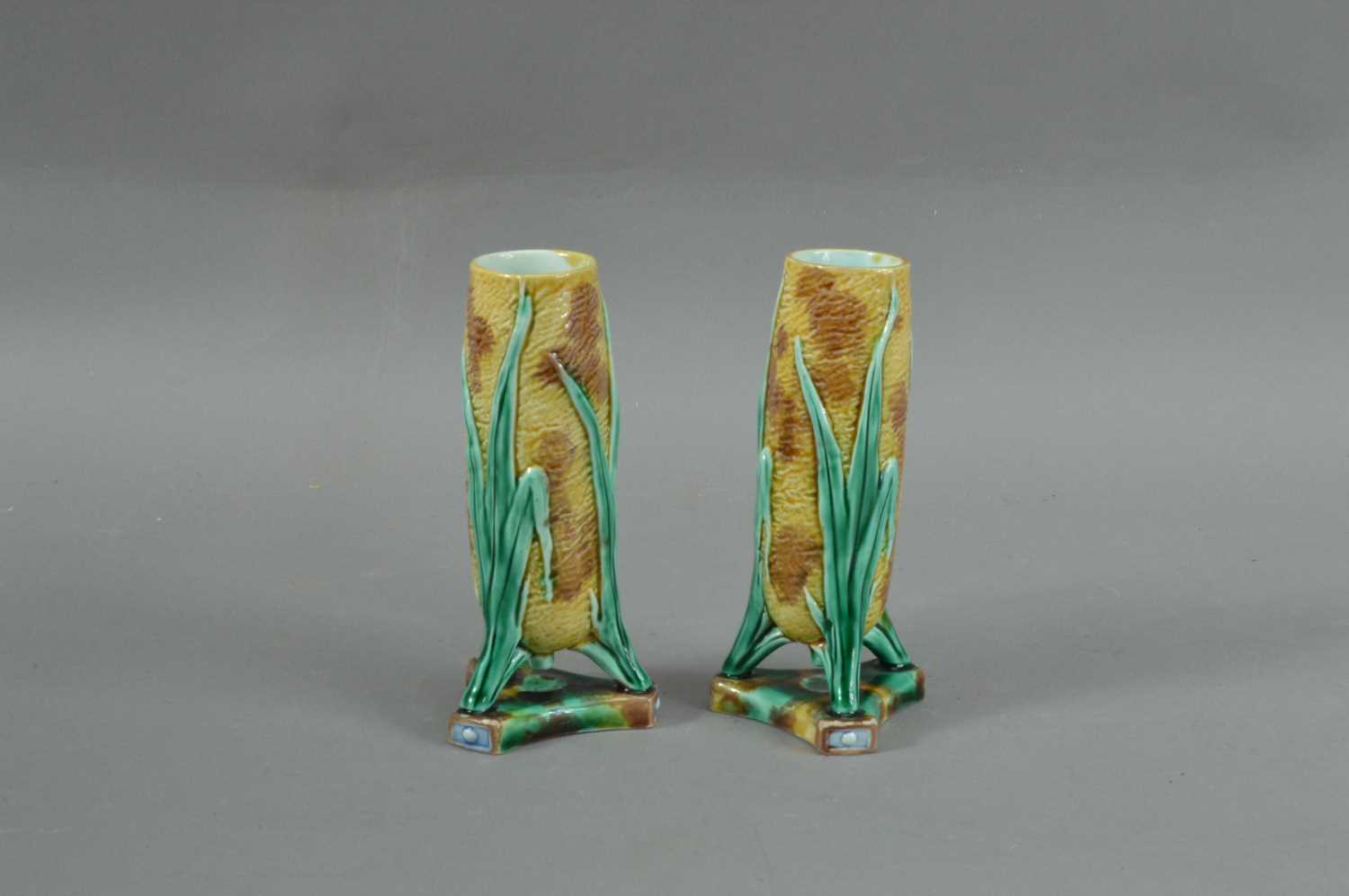 Lot 253 - A pair of 19th century Wedgwood Majolica small vases