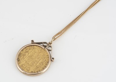 Lot 139 - A Victorian full Sovereign with young head and ansell shield back dated 1872 with Melbourne Mint on a 9ct gold mount and chain, 28.5cm together, 13g