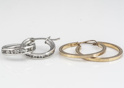 Lot 141 - Two pairs of 9ct gold hoop earrings