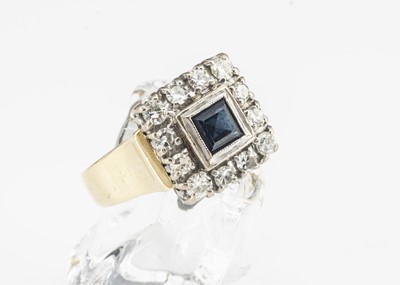 Lot 145 - An 18ct gold sapphire and diamond square cluster ring