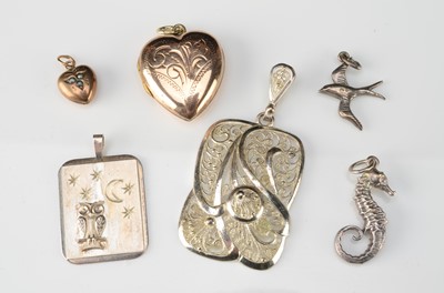 Lot 166 - A collection of silver and rolled gold pendants