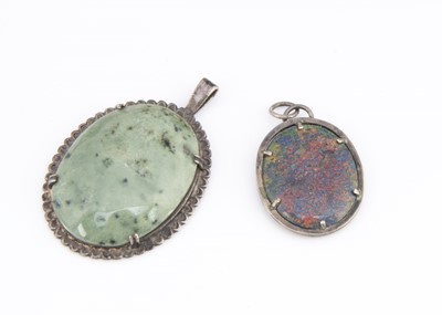 Lot 173 - A synthetic opal silver set pendant