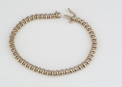 Lot 180 - A 9ct gold diamond set line bracelet
