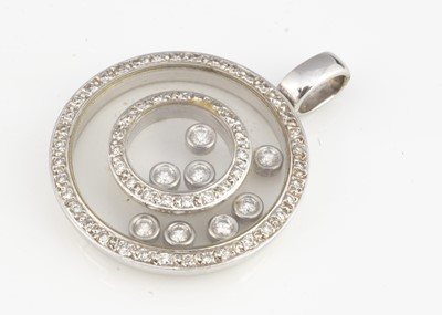 Lot 206 - A continental white gold 750 double diamond set bezel circular pendant