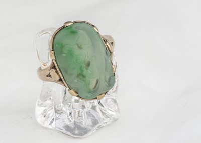 Lot 231 - A certificated Chinese jadeite jade carved panel ring